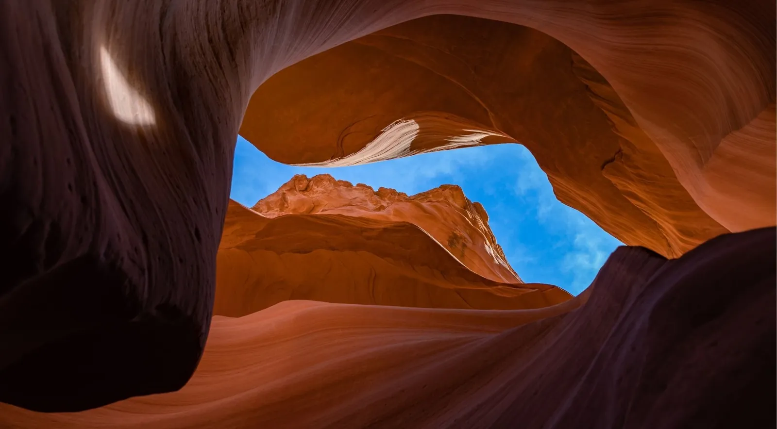 Fluted, glowing walls of Lower Antelope Canyon, the corkscrew slot run by Ken's Tours and Dixie Ellis' near Page, Arizona