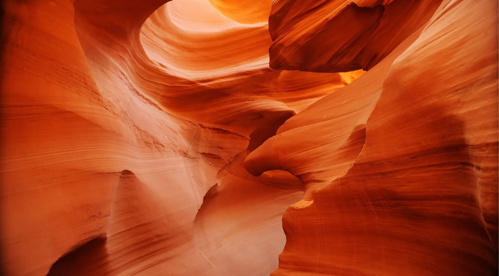 Glowing sandstone passage of Lower Antelope Canyon near Page, Arizona, where every visit requires a booked Navajo-guided tour